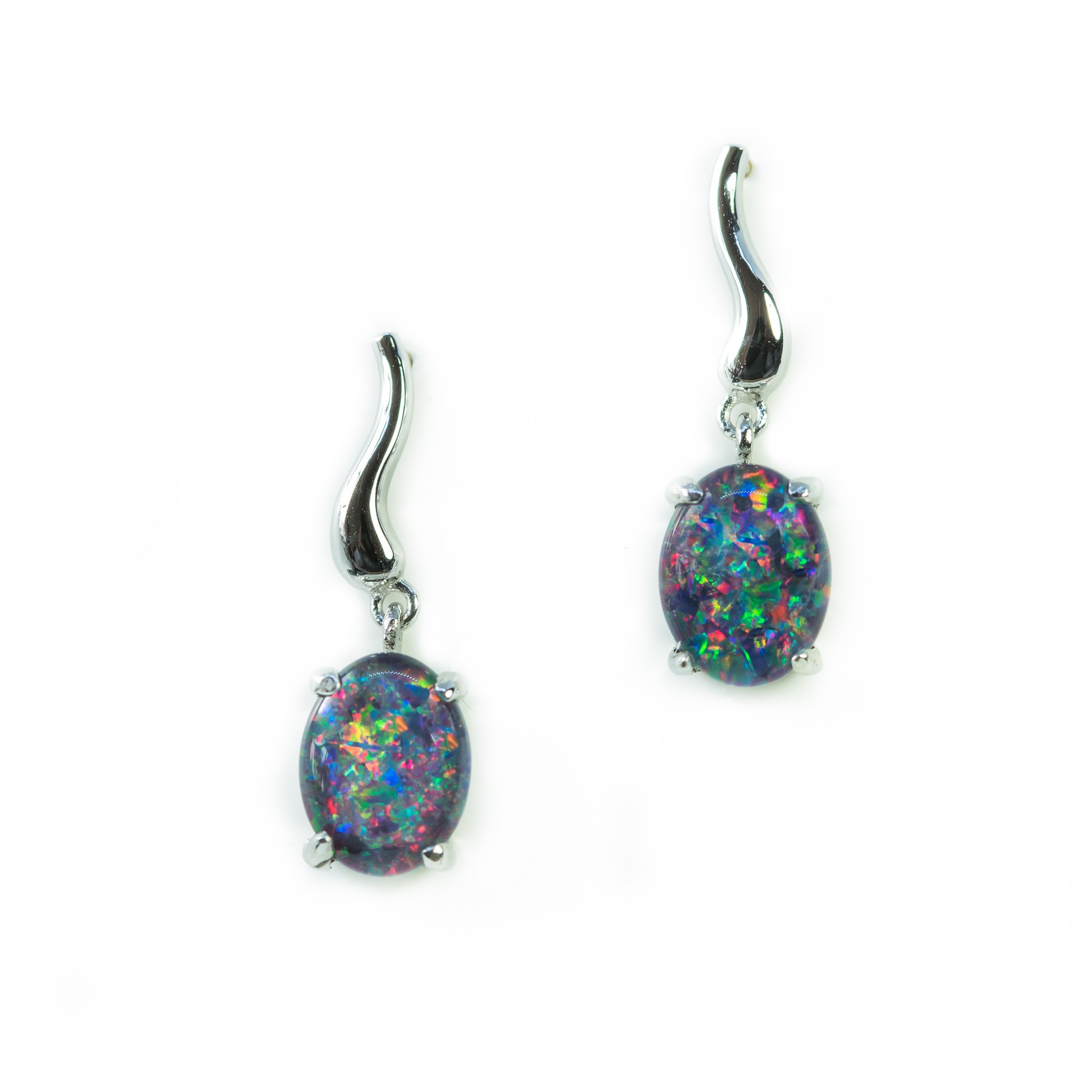 Pair of opal earrings on a white background