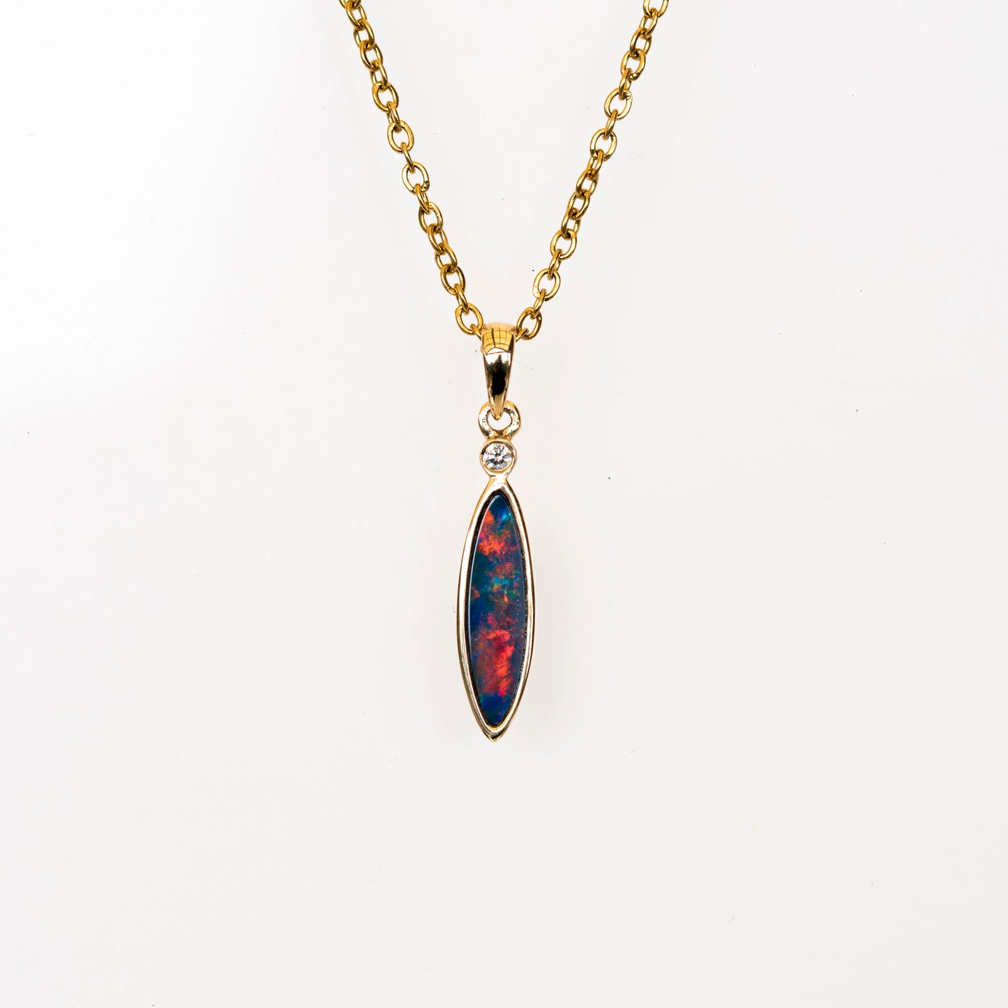 opal Necklace with a pendant featuring a multicolored stone on a white background